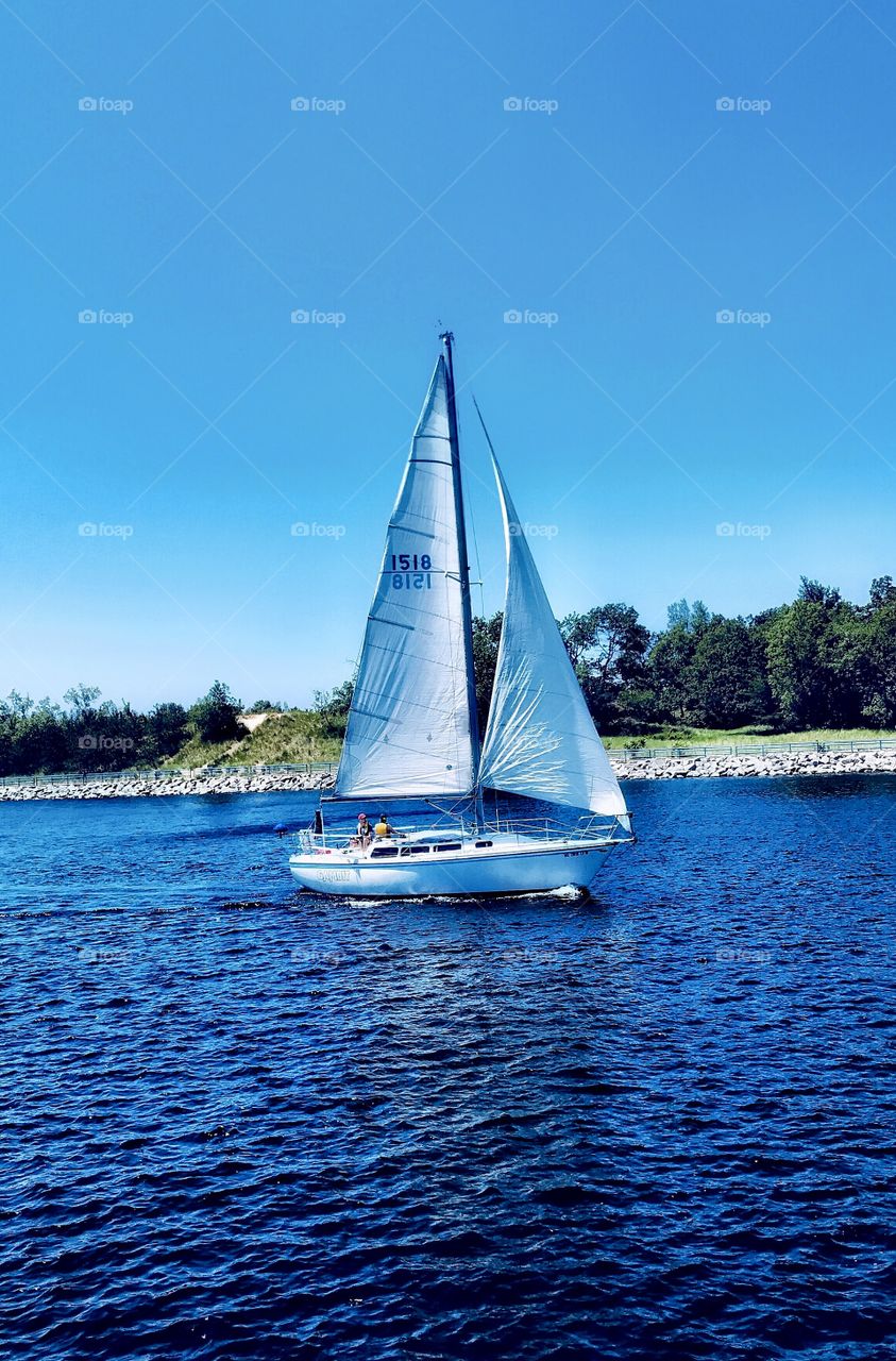 Sailboat on an inlet of Lake Michigan—taken in Muskegon, Michigan 