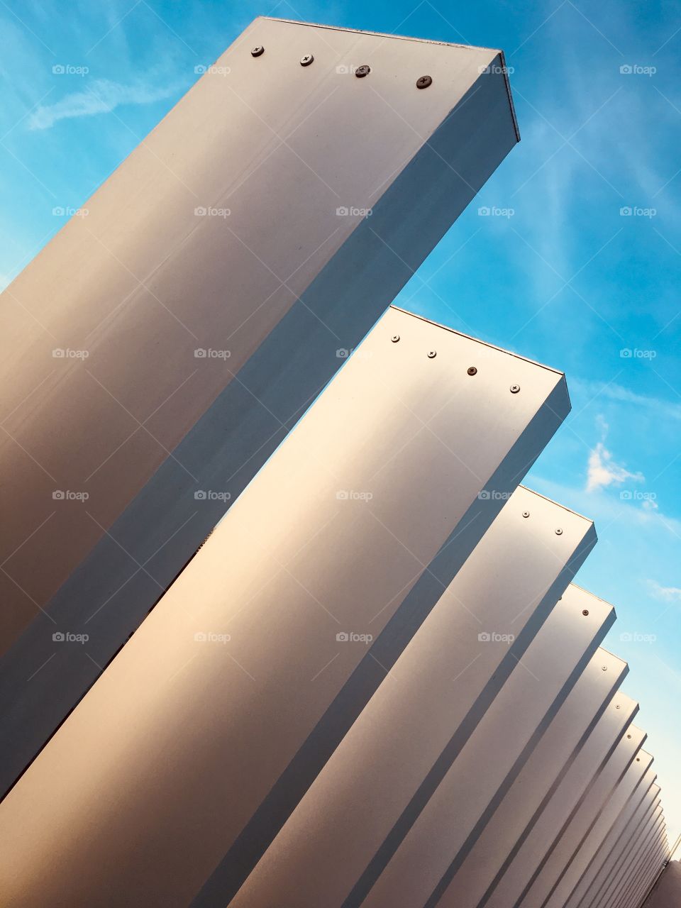 Giant metal dominos guarding the top of the parking garage at Disney Springs in Florida 