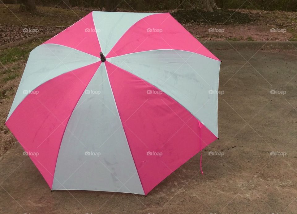 Multi colored umbrella on street