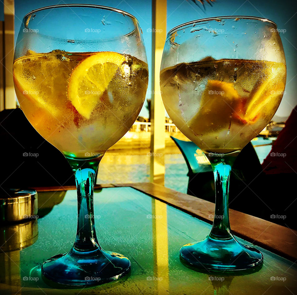 two bowls with gin and tonic and lemon