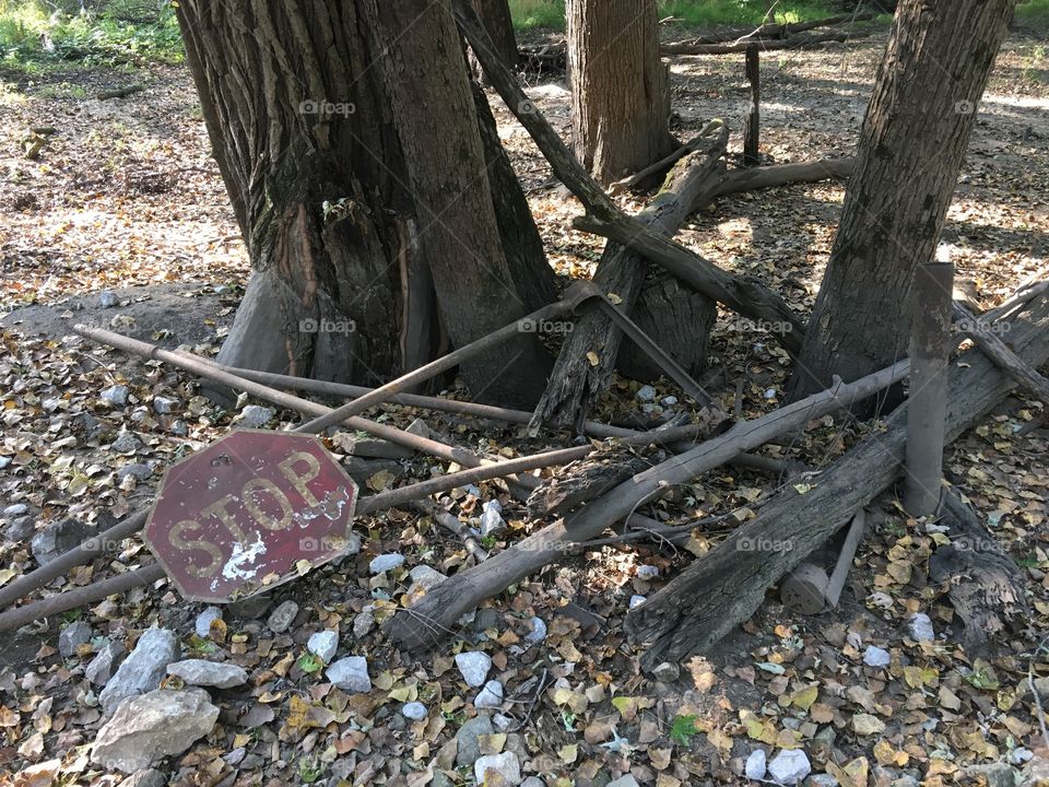 Old stop sign and gate