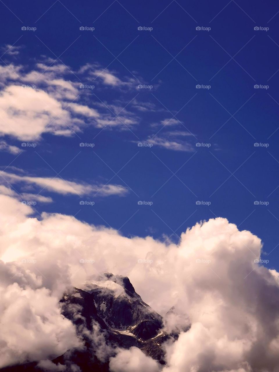 Mountain peaks in clouds