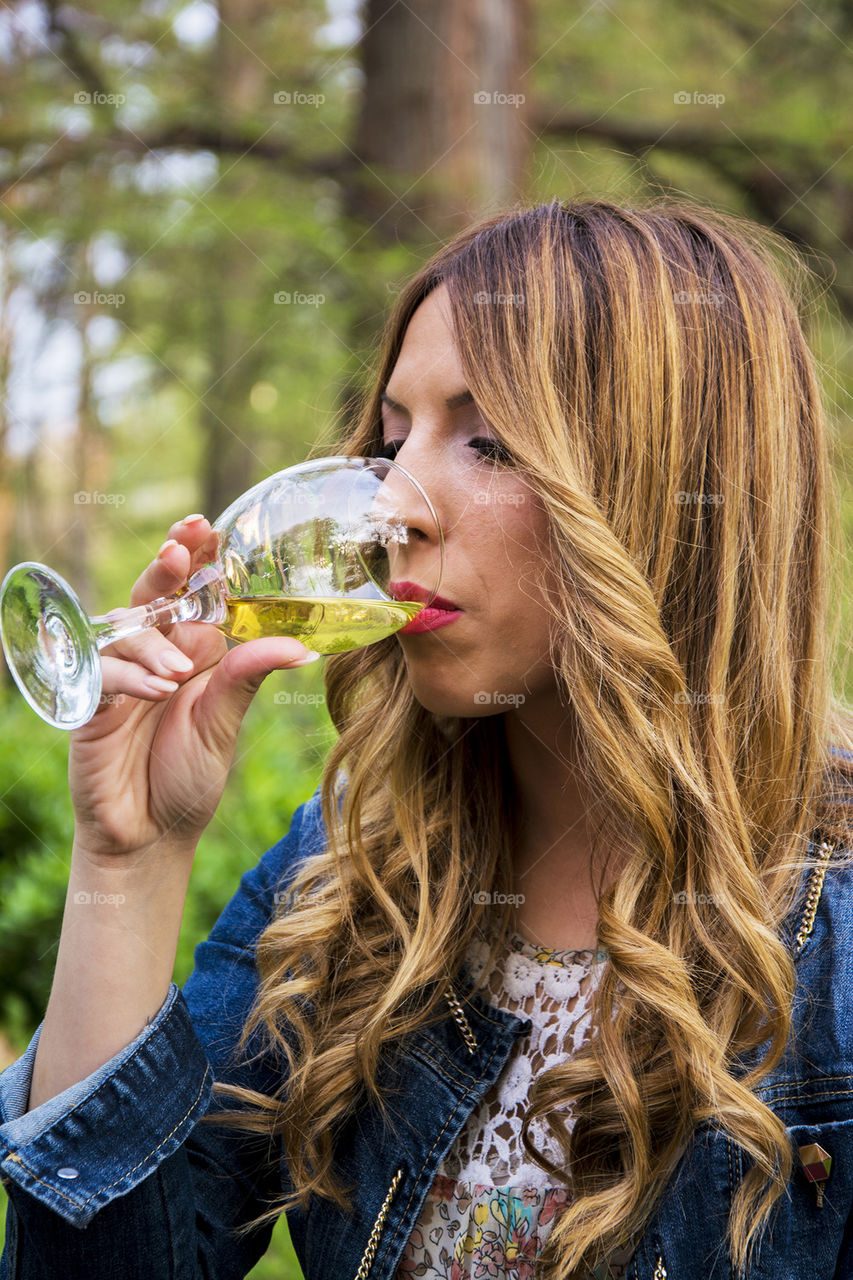 beautiful girl tasting wine