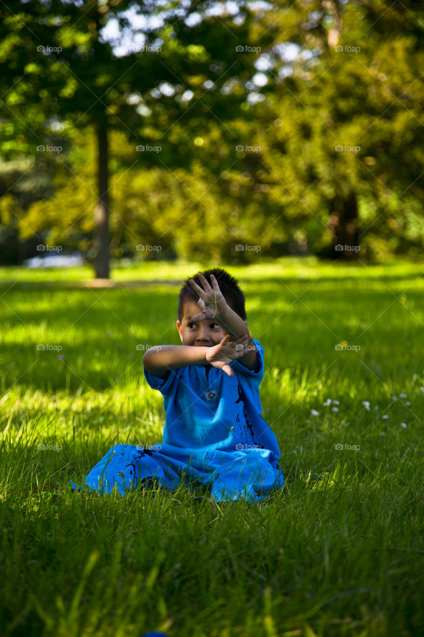 Young boy enjoying spring. Thitiwin at the park