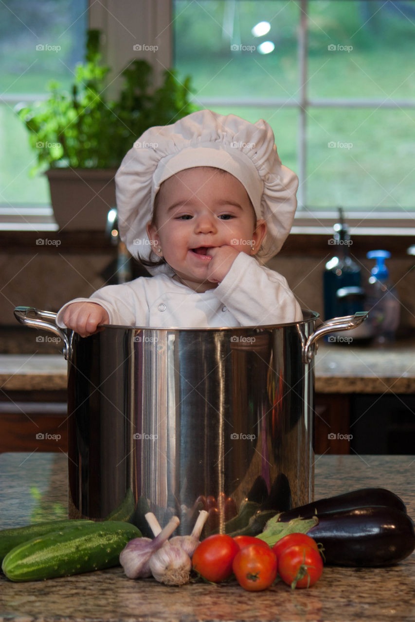 Close-up of cute baby chef