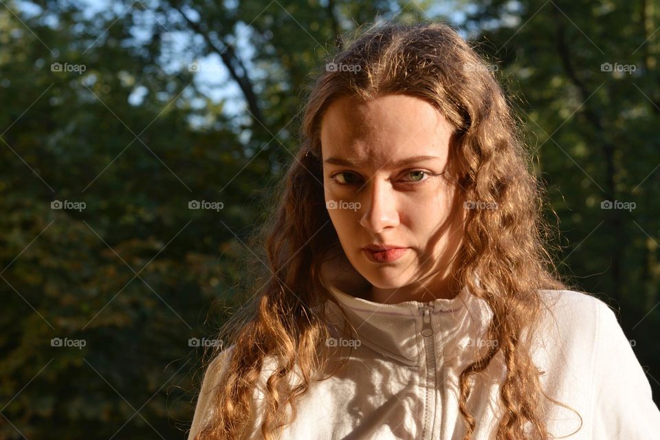 young girl beautiful portrait in sunlight