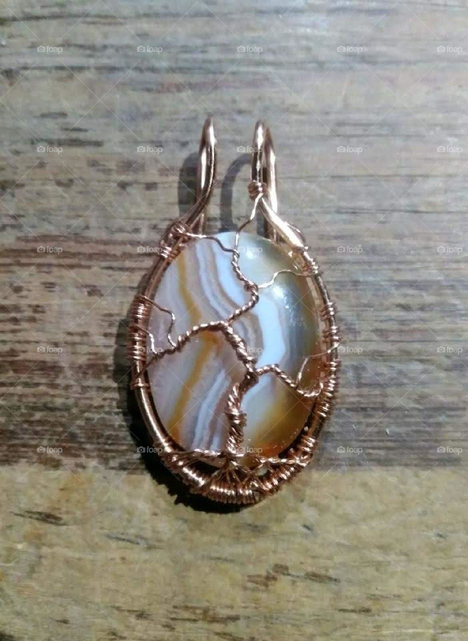 Agate wrapped in copper