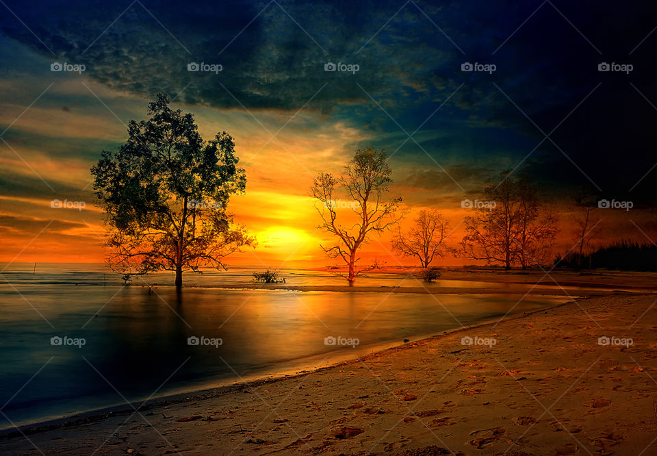 sunset at tanjung beach