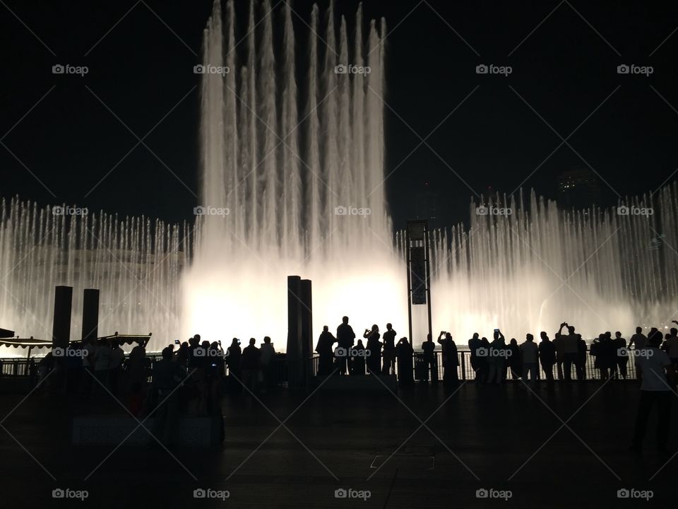 All were watching the lights and the dancing fountain but only the camera eye was there to watch them :-)