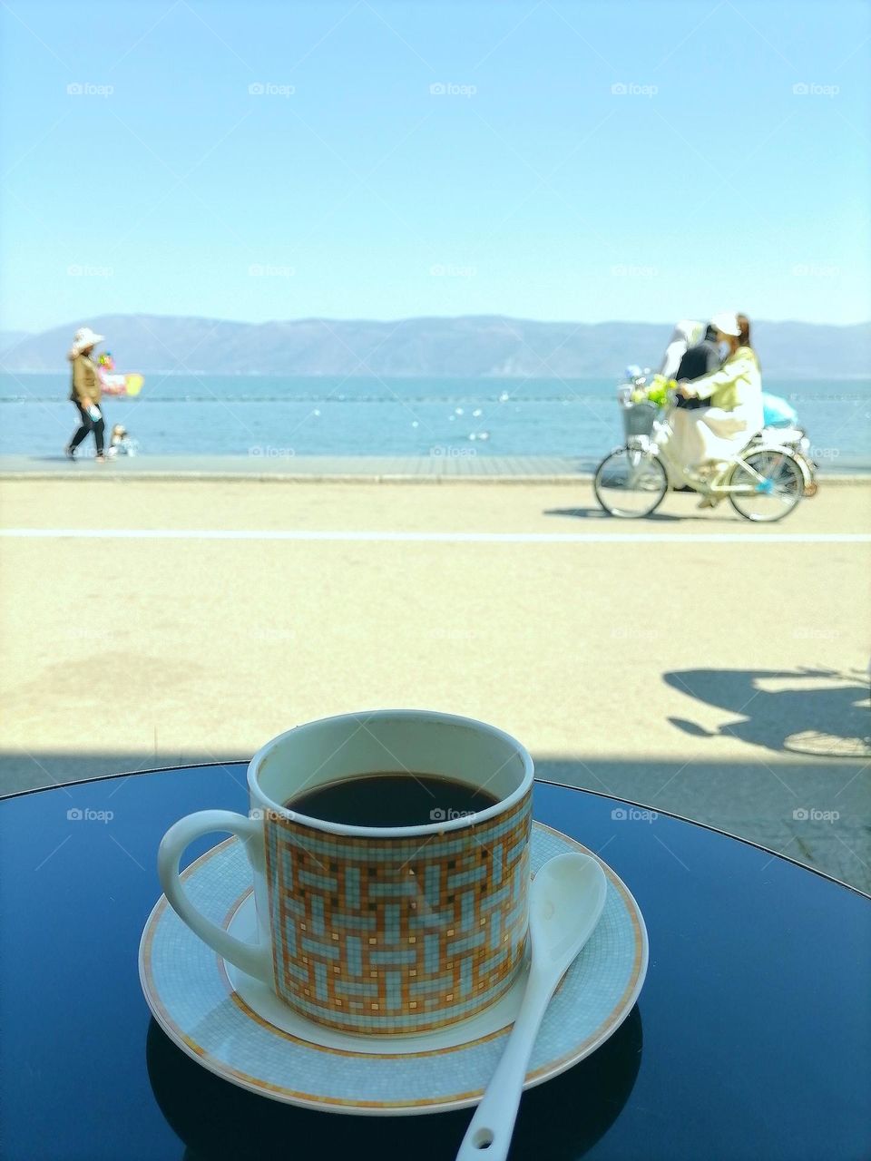 Afternoon relaxing with my coffee by the lake