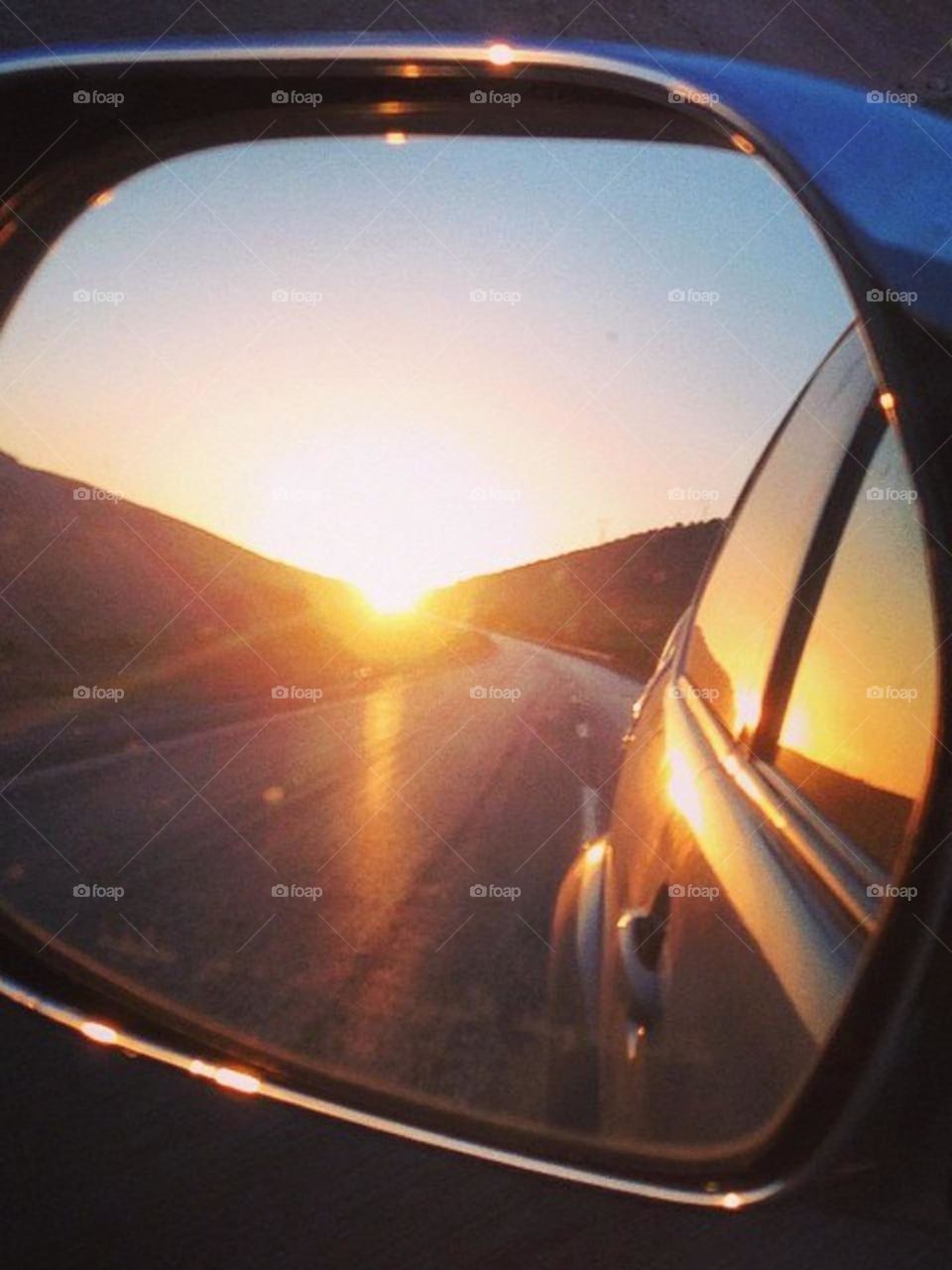 Beautiful sunrise in the mirror