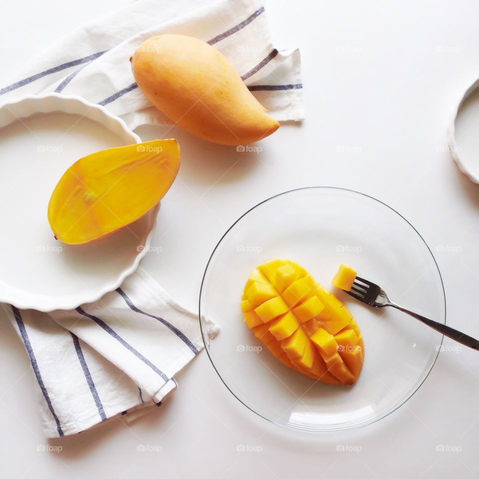 High angle view of mango slice