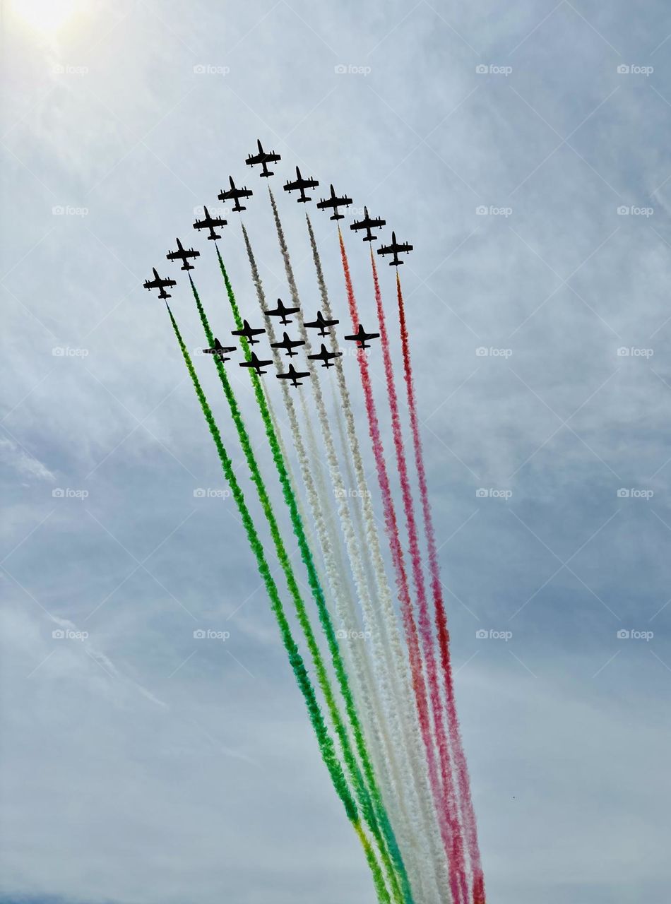 The Royal Canadian Air Force's (RCAF) Snowbirds and the Italian Air Force's Frecce Tricolori fly over Ottawa.