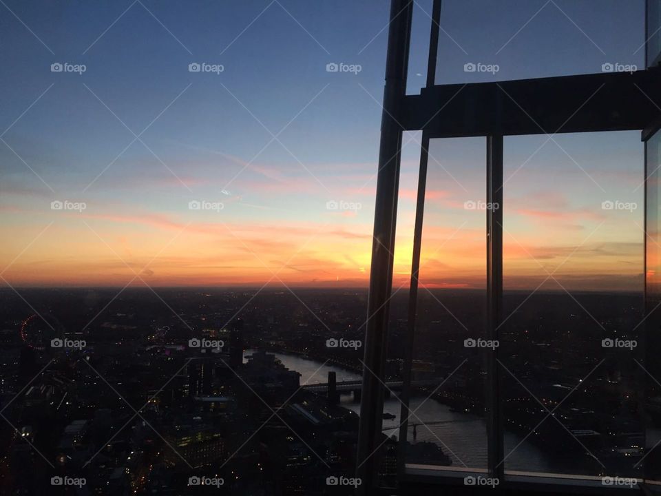 Sunset over London skyline from the shard. 