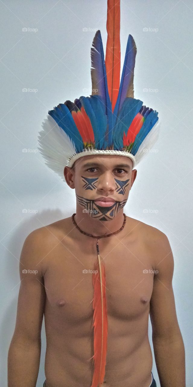 we indigenous people are protectors of nature. This painting on my face means care and the headdress on my head means struggle!ππ½