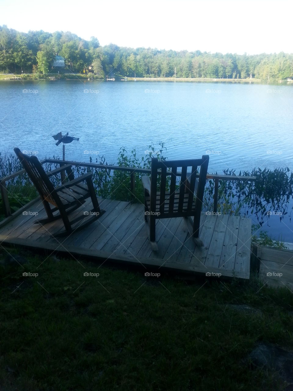 two chairs. lakeside