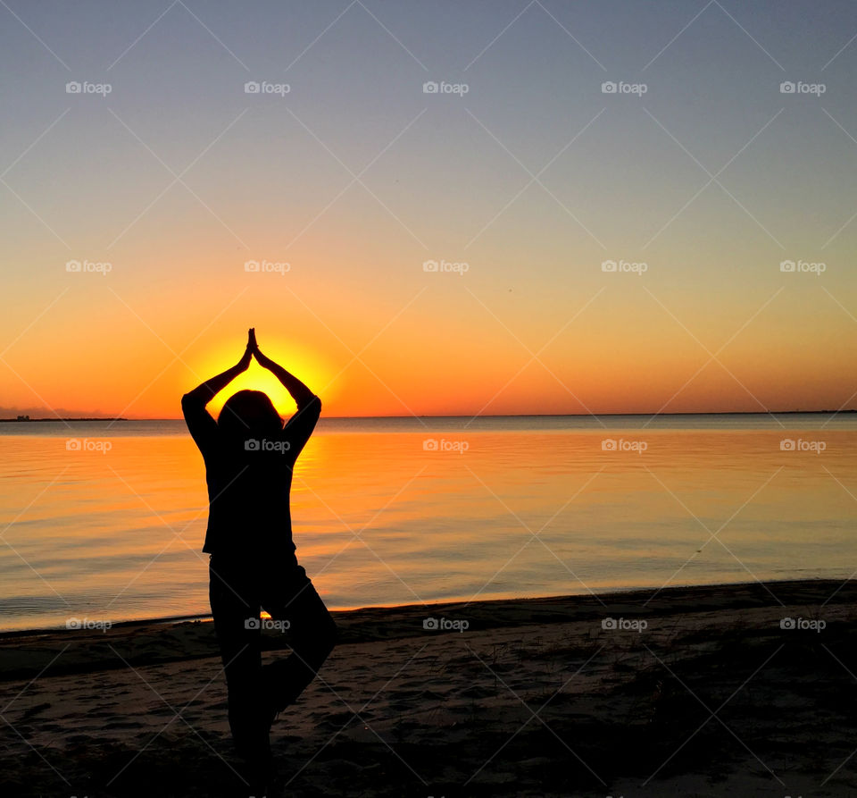 Yoga Stance!
Capturing the sun between her hands during yoga demonstration!