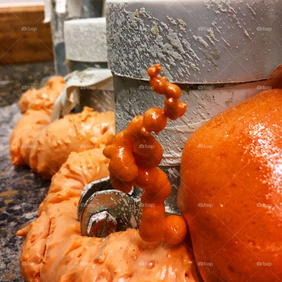 This is some foam insulation that oozed out of the floor in a building I painted 