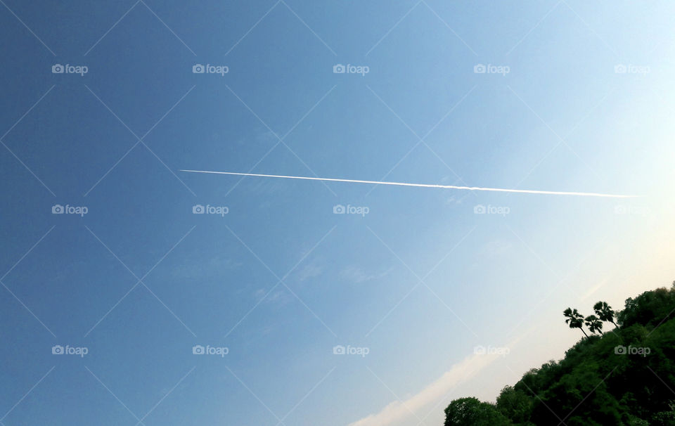 Aircraft vapour trail in sky