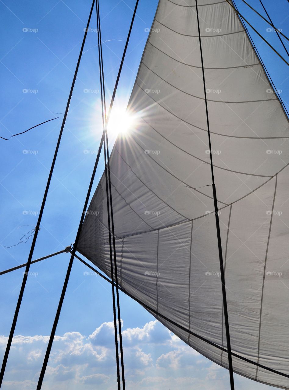 sun rays through the sail