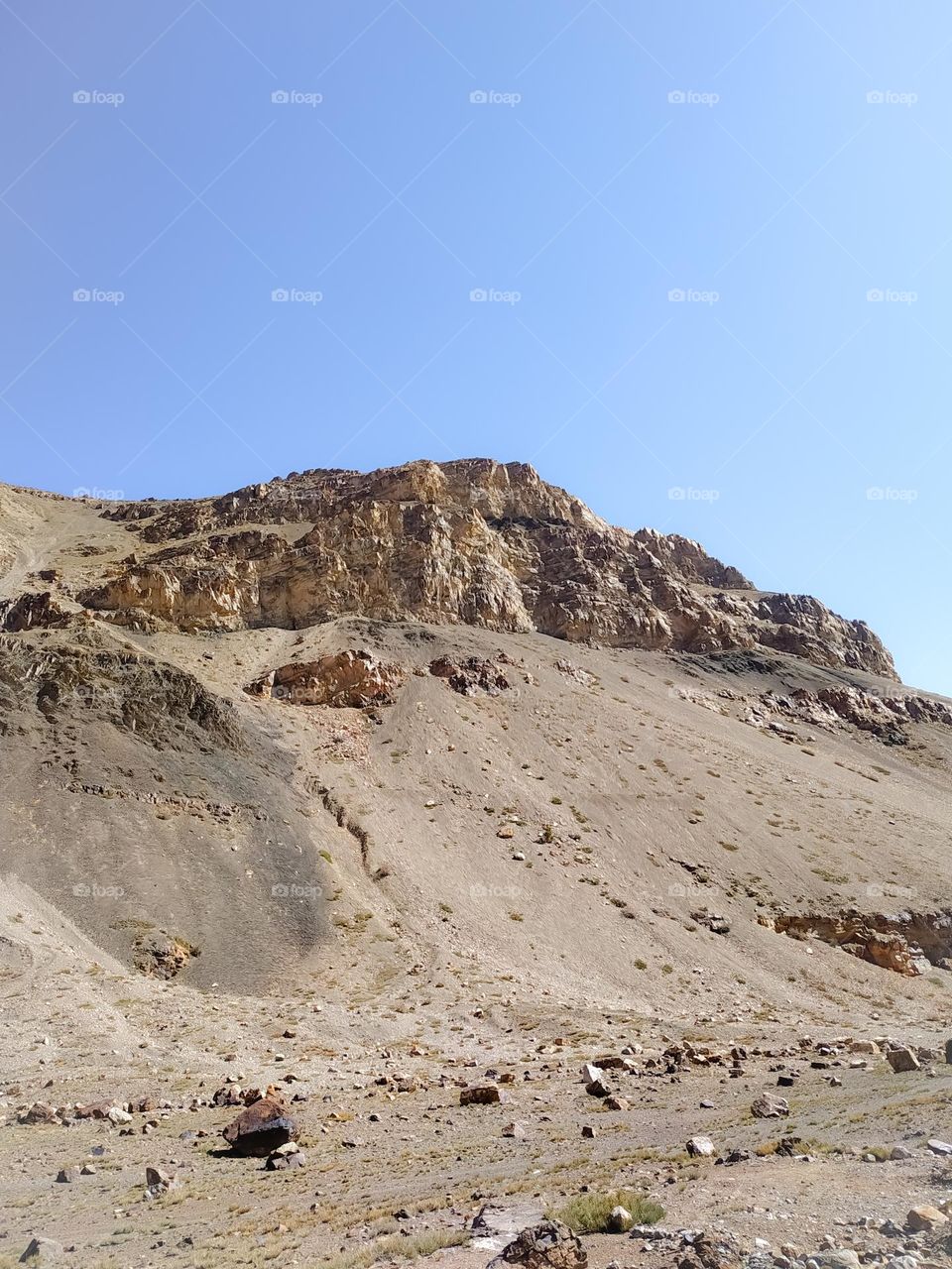 amazing view of stones mountain on blue sky background