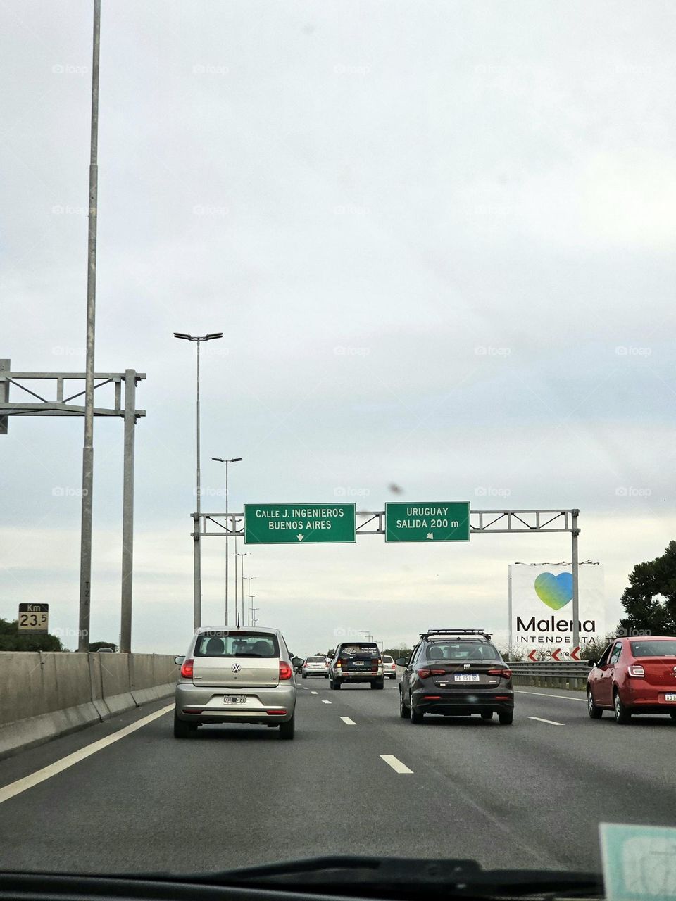 Cars on a Highway, each in their lane, commuters from the suburbs go to town