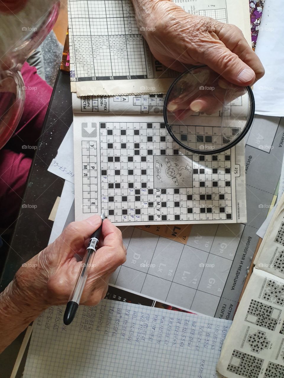 grand mother solving crosswords