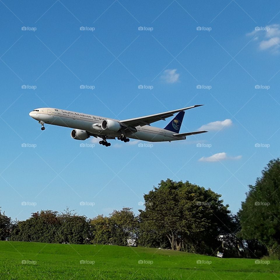 Saudi  Arabian Boeing 777 landing at Heathrow airport.