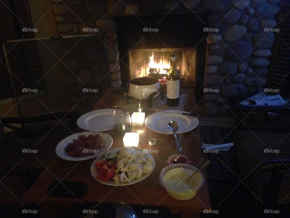 Candle and fire lit dinner