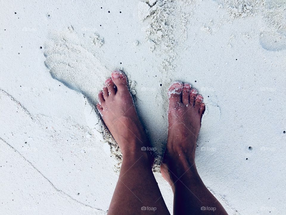 Toes in the White sand