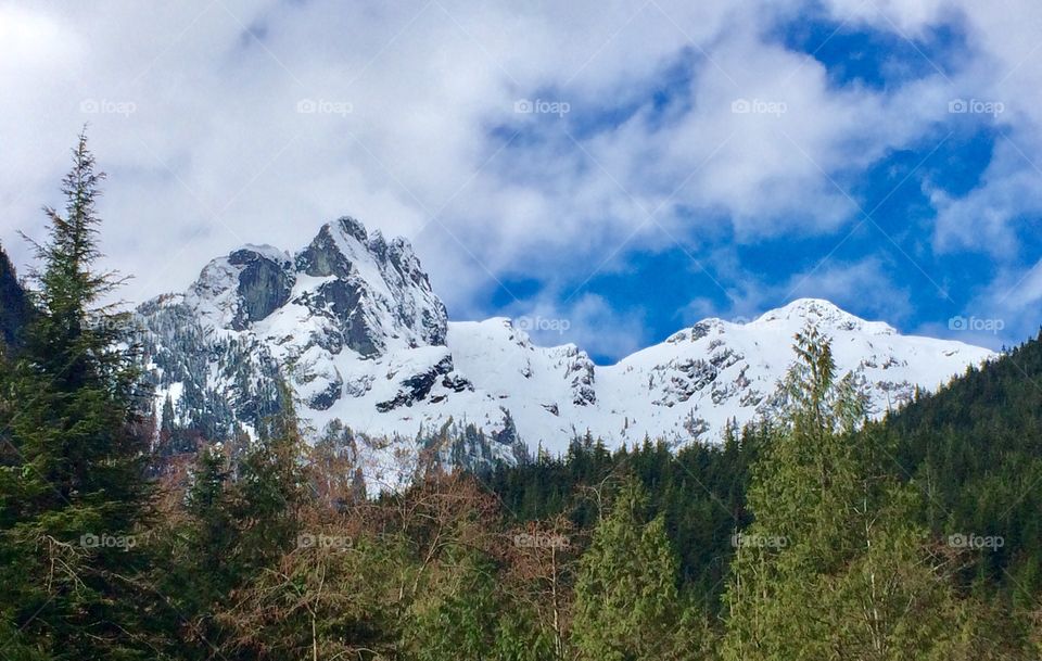 A Spring Hike through Golden Ears Provincial Park in BC Canada. A light dusting of fresh snow highlighted the mountains.