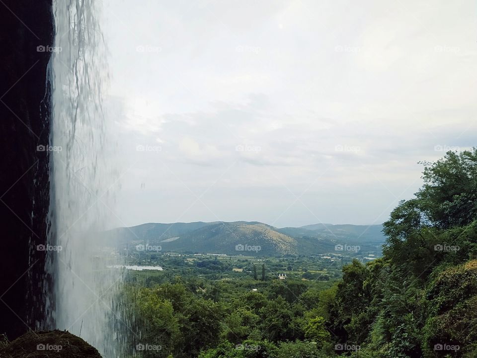 under the waterfalls