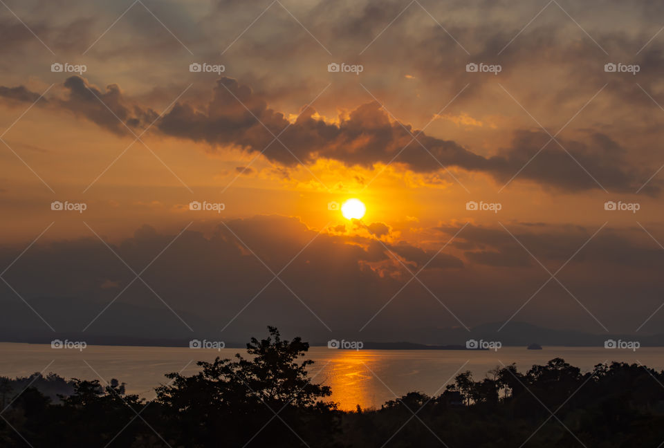 sunrise over Si Nakharin dam at Huay Mae khamin waterfall Nation