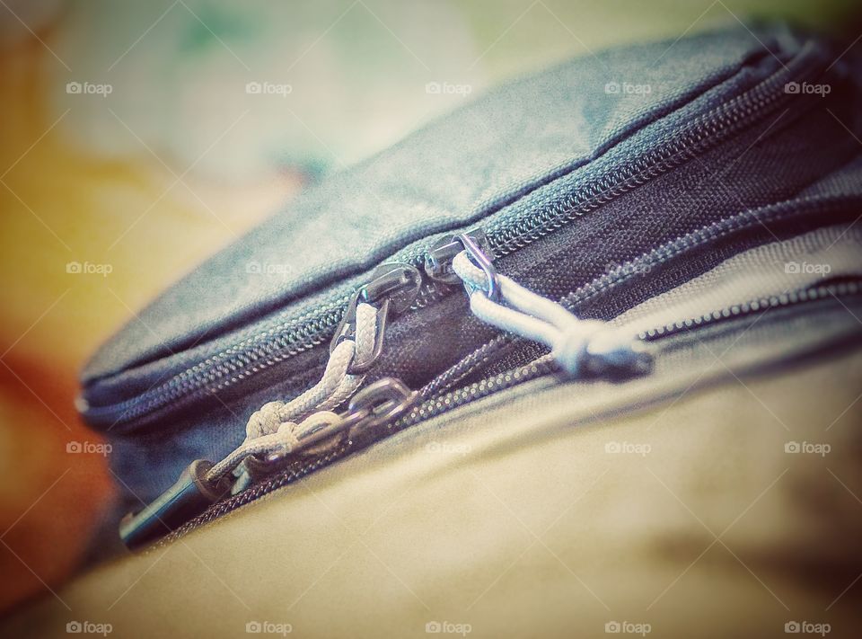 Zipper system on a pouch of a camera bag. A close up view.
