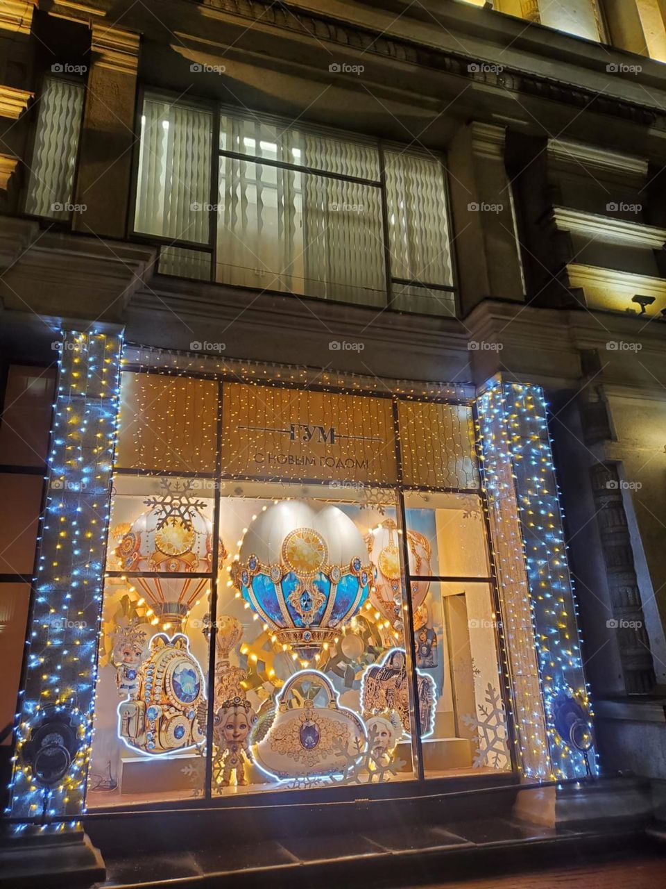 It is almost Christmas. Nicely decorated lighted window 