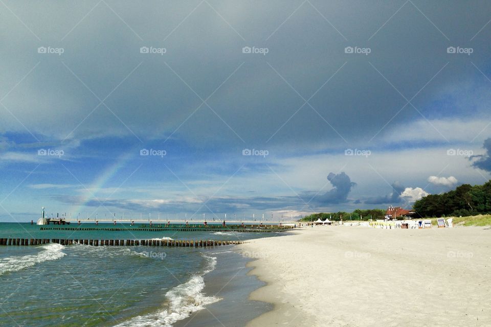 Rainbow at the Baltic Sea beach
