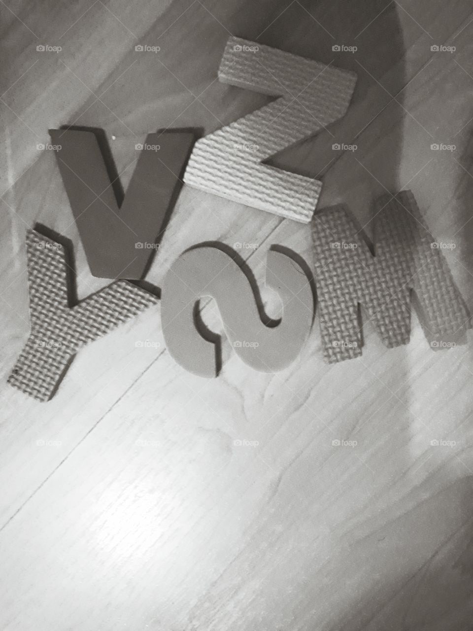 Foam Toy Letters on the floor- Black and white is my true nature