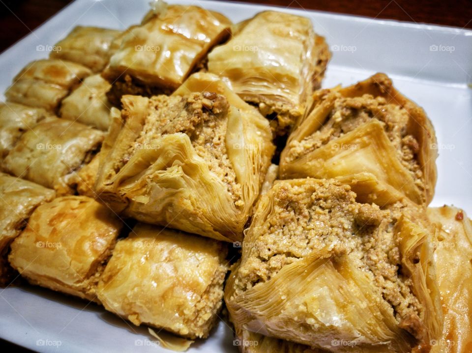 Baklava - different varieties. Rich, sweet pastry made of layers of filo filled chopped nuts, sweetened and held together with syrup or honey. Popular around Mediterranean, Central and West Asia.