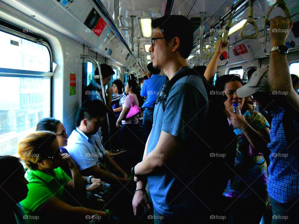 passengers or commuters in a train coach