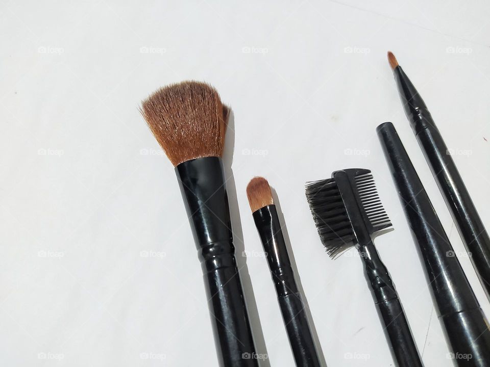 Makeup brushes isolated on white background