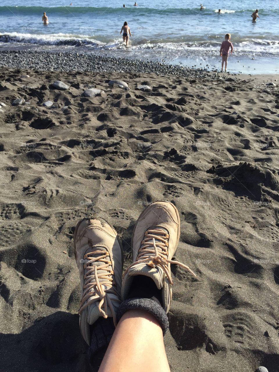 Instead of hiking - lie down on the black sand beach and enjoy sunshine, the sound of the sea and the children having fun in the water... That's it.