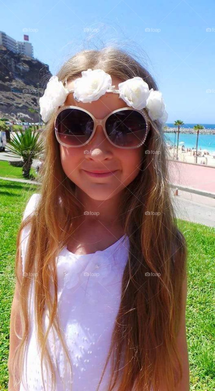 little girl in the summer sun