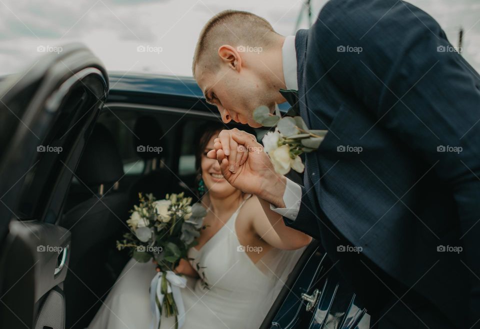 A kiss on the bride's hand