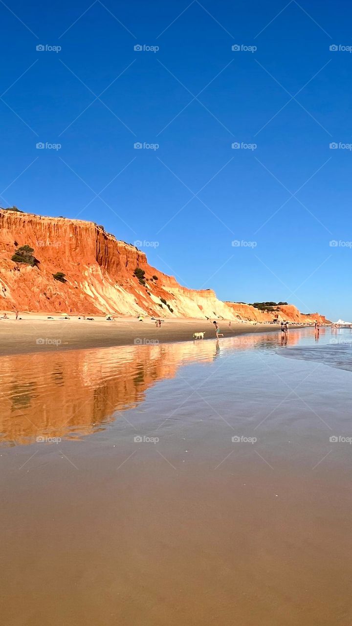 Portugal Beach Mars and Sky
A stunning contrast of sky-blue and terracotta — Portugal’s cliffs and beach look like another planet.
