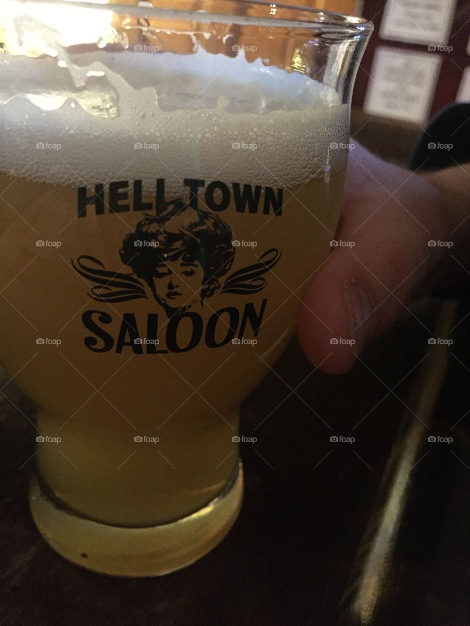 Refreshing beer in Hell Town Saloon mug 