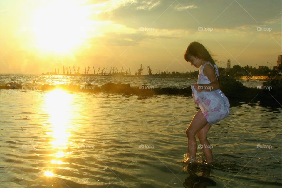sunset and a little girl