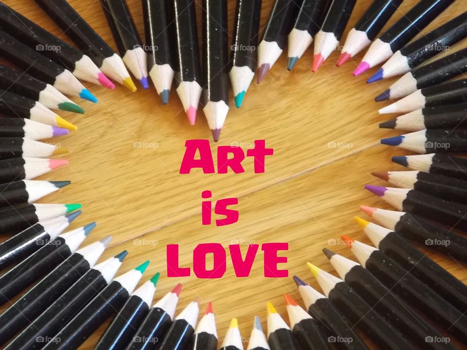 Heartshape made by colorful pencils