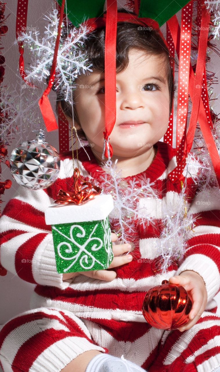 Baby in Christmas clothes