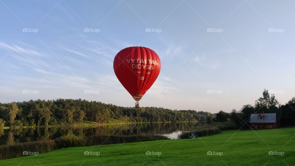 A hot air balloon taking flight in the county of Vilnius, Lithuania.