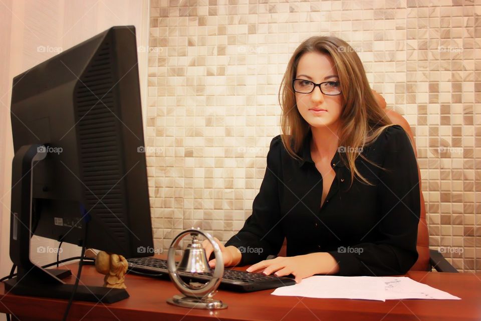 Business woman. Business woman near computer in office